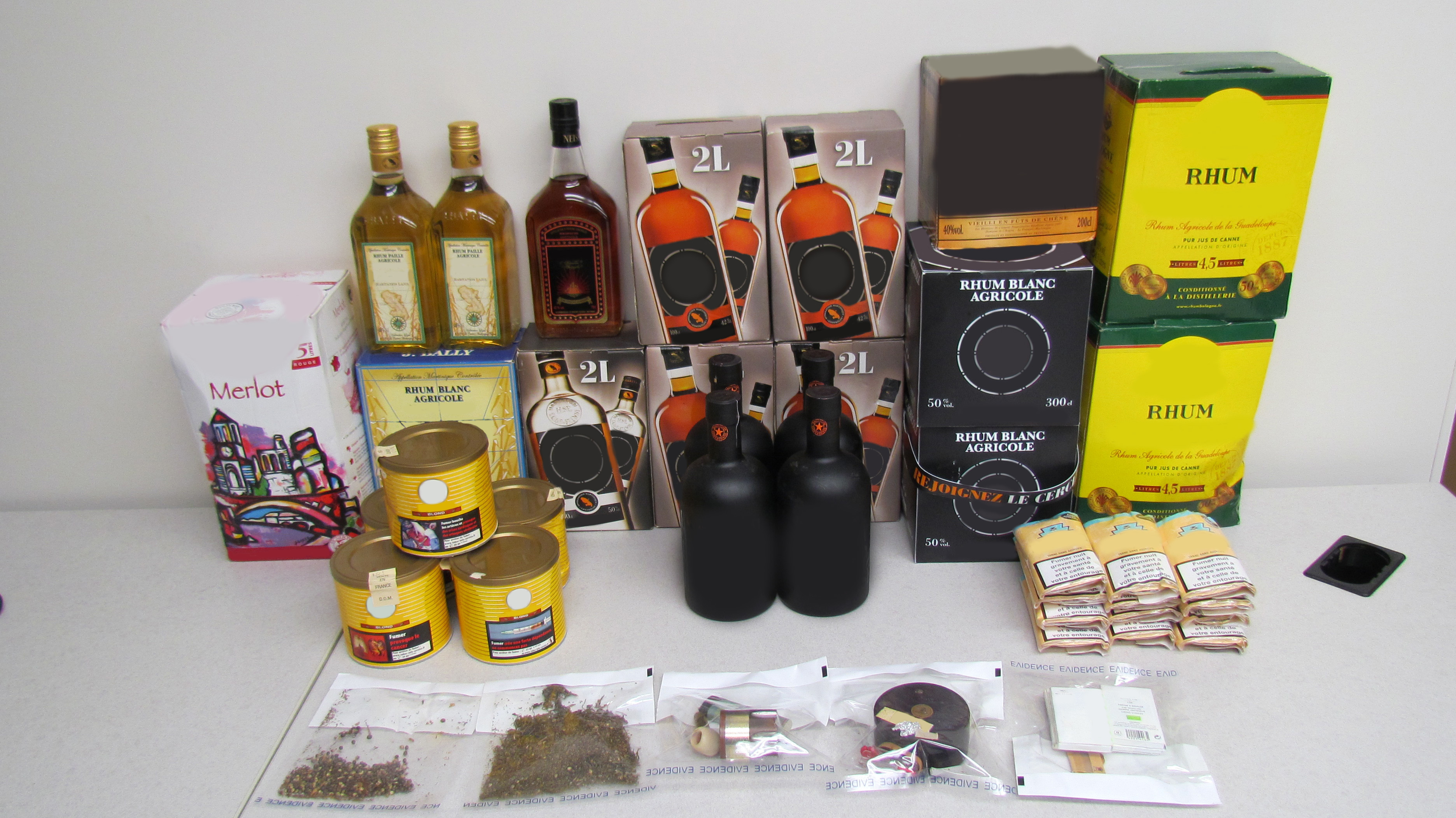 Goods seized at Shelburne, Nova Scotia on June 7, 2016, including 39.9 litres of alcohol, 0.79 kg of tobacco and 17.46 grams of marijuana.
