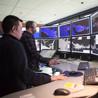 MCTS officers at their workstations.