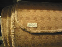 Label sewn on to textile.