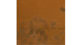 Fingerprints on a copper surface.