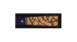 Rapid rusting on a steel putty knife. The rust that forms is bright orange.