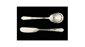 Two pieces of sterling silver flatware.