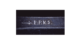 The back of a silver-plated fork stamped with the letters E.P.N.S.