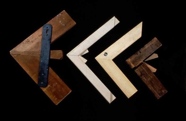A photograph of four stretcher corners, each showing an example of a different mechanism to expand a stretcher.