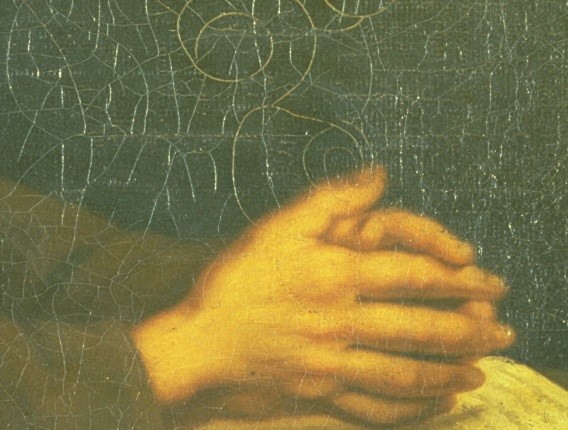 Close-up photograph of a pair of hands in a painting, revealing many cracks in the paint.