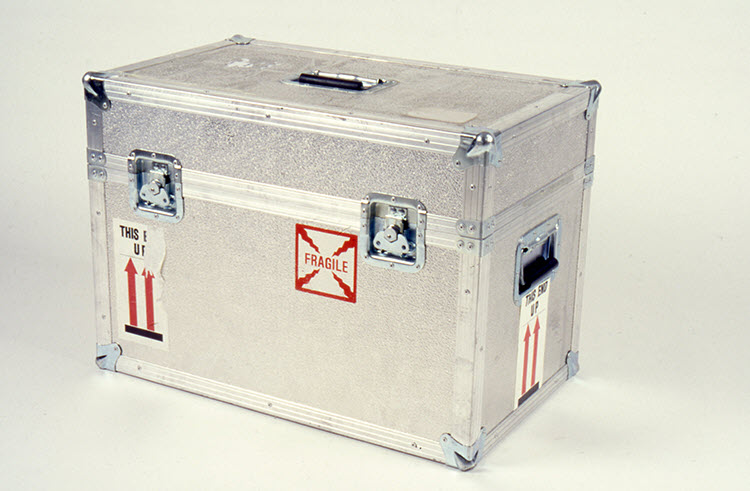 Road case with aluminum/plywood laminate panels held together with riveted aluminum extrusions