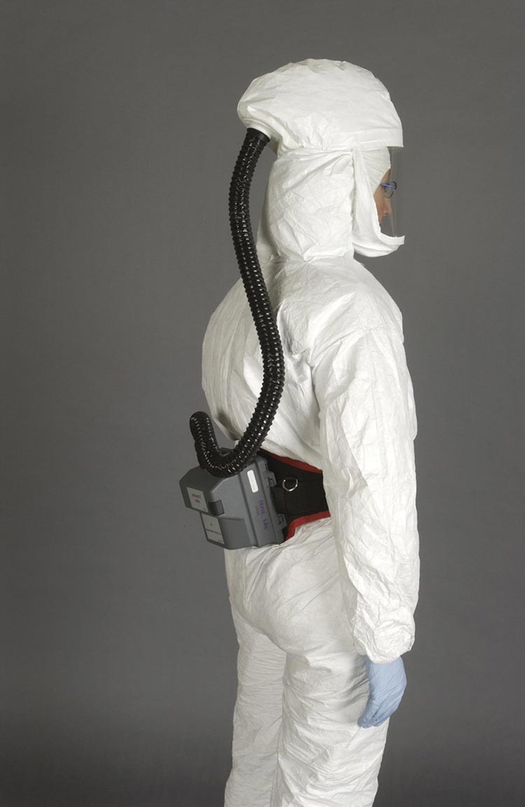 Figure 16a. Conservator wearing a 3M Air-Mate HEPA 12 PAPR system