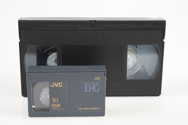 Size comparison between a standard VHS and a VHS-C cassette