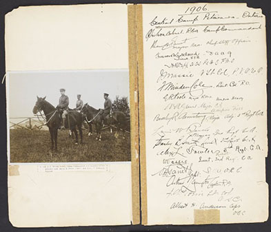 Stains on a historic scrapbook caused by tape adhesive: before treatment.