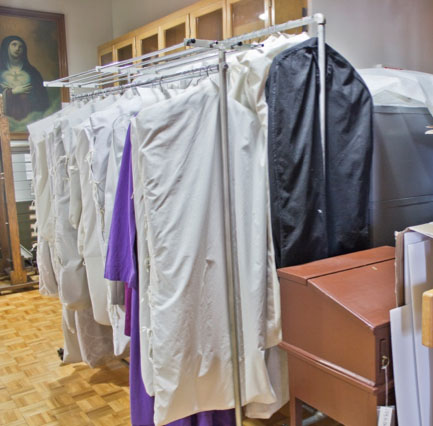 The same section of the collection storage area, with furniture and costumes before RE-ORG