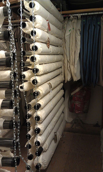 Storage of rolled textiles in the textile storage room after RE-ORG