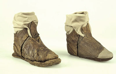 The shoes after treatment and on their mounts.