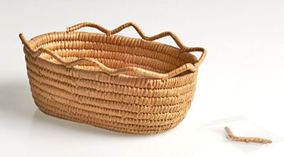 An oval basket broken at the rim.