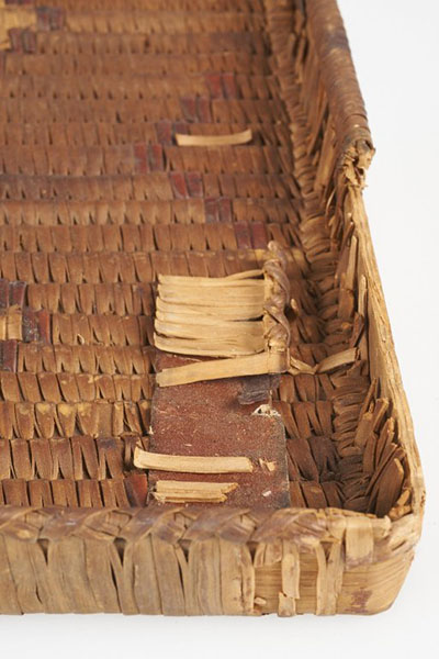 Basket damaged by the use of tape.