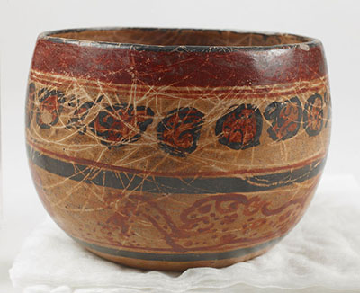 A scratched ceramic bowl.