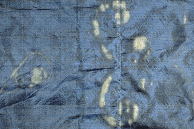 Detail of the deterioration of the silk lining upon which the beads were stitched.