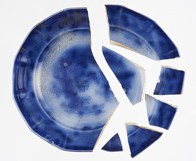 A broken china plate.