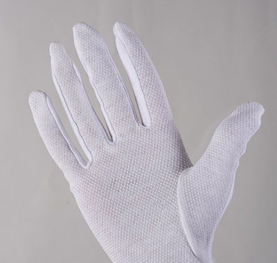 Sure Grip cotton gloves with white Polyvinyl chloride dots (or nodules).