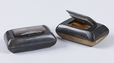 Snuff boxes made of molded horn.