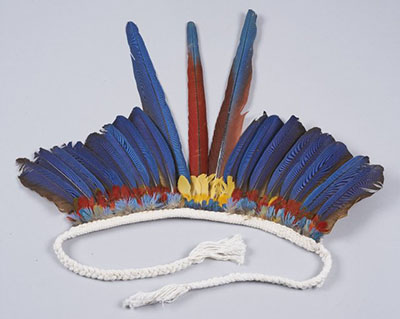 A feather headdress from Brazil, probably made of parrot or macaw feathers.