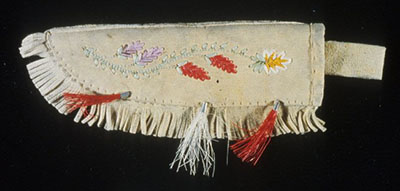 Moose hair embroidery and decorative tassels on a knife sheath.