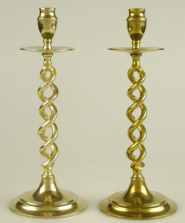 Polished brass candlesticks.