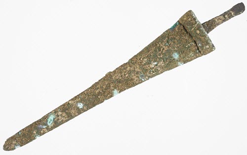 Bronze disease on an archaeological copper alloy blade.