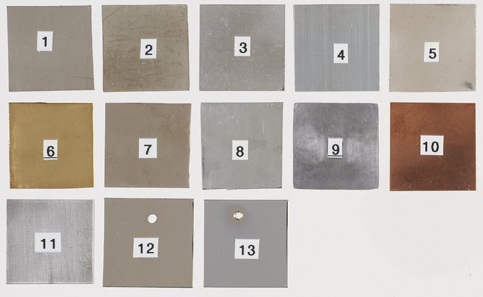 Display with 13 numbered metal samples.