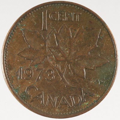 Penny with brown surface patina.