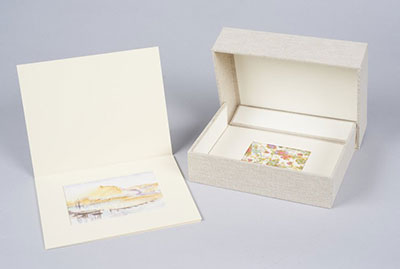 Window mat and sturdy archival-quality box.
