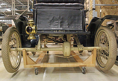 Back view of a support dolly inserted under the axles of the Le Roy car.