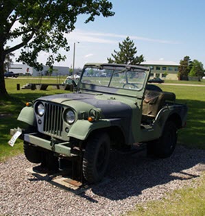 A military vehicle displayed outdoors.