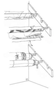 Examples of a bracket storage system for rolled carpets.