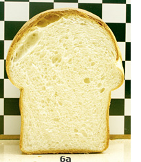 6a. A loaf of wheat bread made with white flour, cut to show interior of loaf.