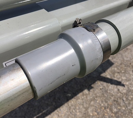 Photo of a rubber gasket boom sleeve used to maintain air-tight connections.
