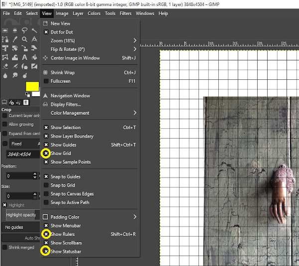 Screenshot of photo loaded in GIMP. “Show Grid,” “Show Rulers” and “Show Statusbar” are all selected in the “View” menu.