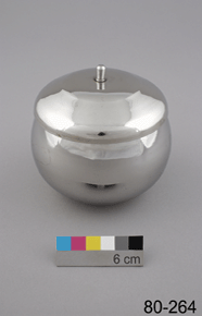 Colour photo of rounded steel container with lid, includes a 6cm colour scale and 80-264