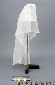 Colour image of translucent – white veil on pedestal, with catalogue number 69-94.5 & 69-94.7 on a grey background.