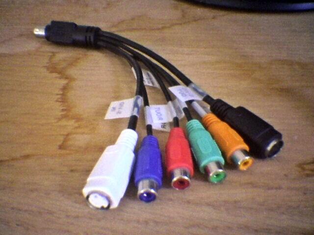 Image: VIVO cable, capable of receiving an analog signal from an S-video port or (traditional) RCA plugs on a camcorder or VCR. The end with only one plug connects to your VIVO port on your PC. At the other end of the cable are multiple plugs; a multi-socket plug (typically white) connects to your VCR/Camcorder if that device has an S-video-out port. The audio connection is done separately.