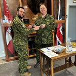 Capt Solar and Maj Gray collecting money for the NDWCC Spagetti lunch. Capt Solar and Maj Gray
