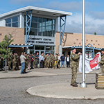LCol Jack Nguyen (BComd) and MWO Darlene Skinner (A/BRSM), stood at the event flagpole while preparing to raise the United Way Flag for kick-off ceremonie for CFB Shilo.
