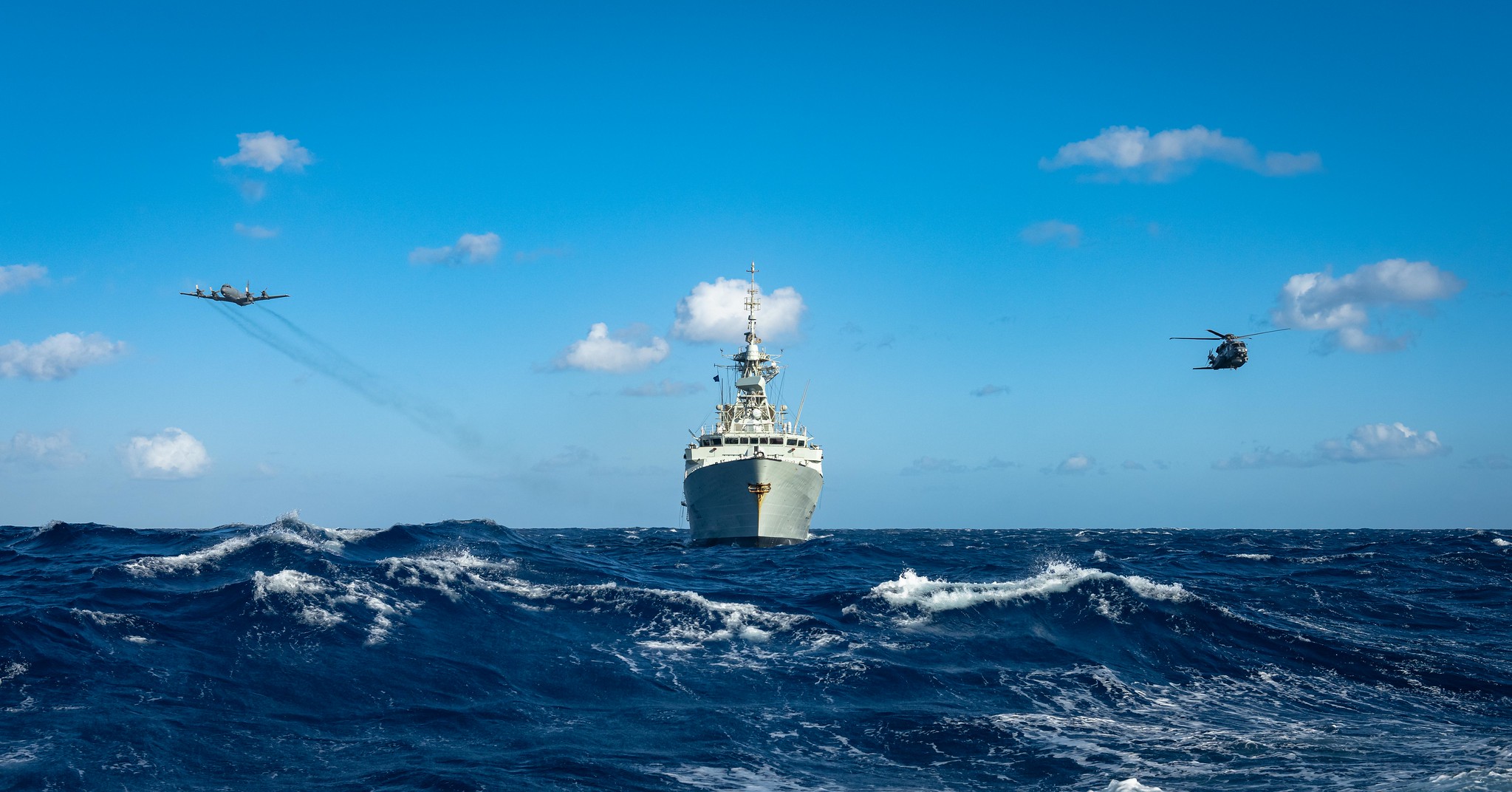 HMCS MONTREAL, its embarked CH-148 Cyclone helicopter, call sign Strider, and a CP-140 Aurora aircraft, call sign Demon 02, patrol the Mediterranean Sea to help build maritime situational awareness in associated support of NATO’s Operation SEA GUARDIAN on April 11, 2022.