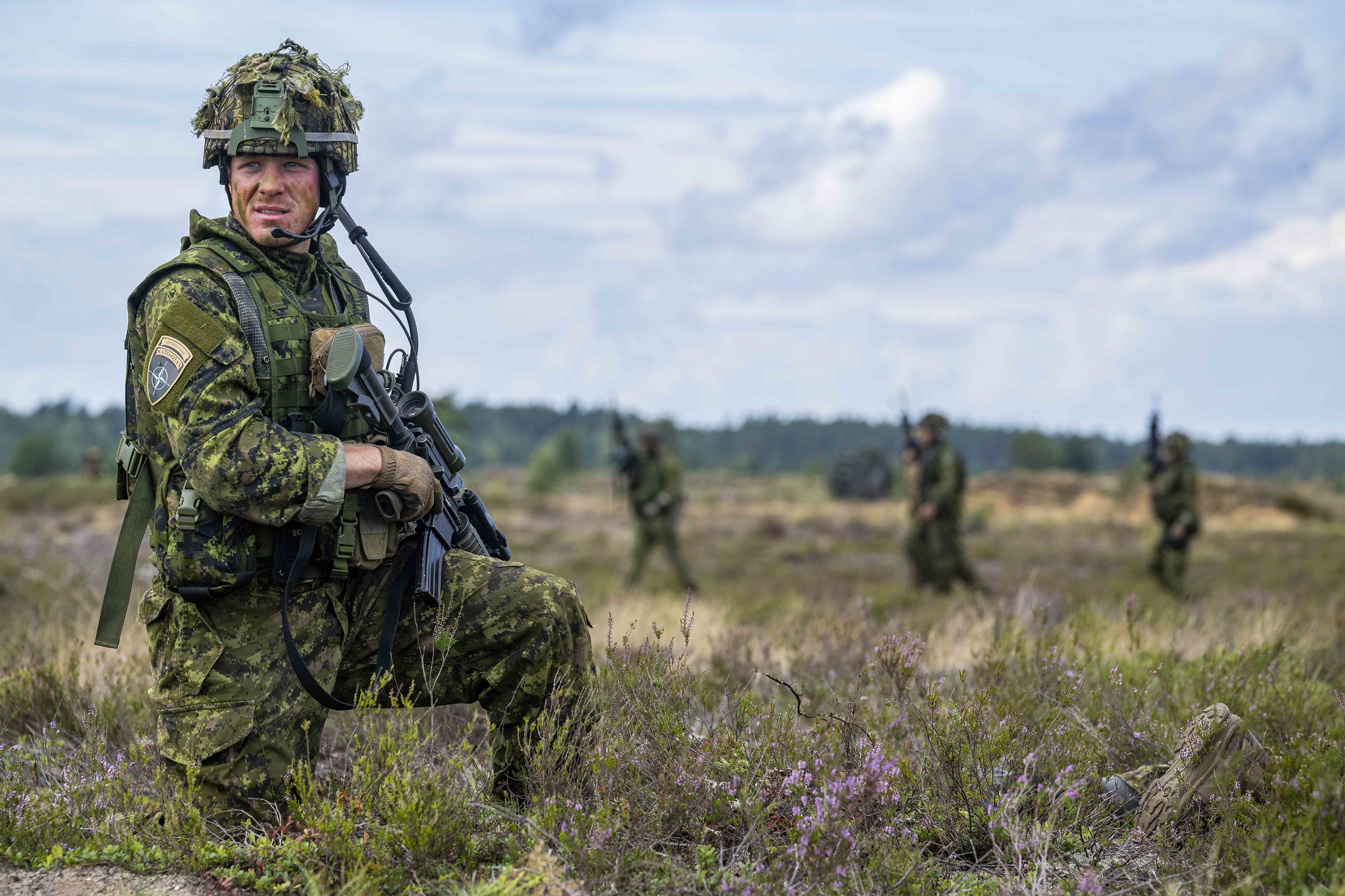 Canadian Armed Forces members from 1st Battalion, The Royal Canadian Regiment, as part of NATO enhanced Forward Presence Battle Group Latvia, clears out opposing forces during EXERCISE TITAN STRIKE at Camp Ādaži, Latvia on 10 August 2023.