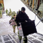 After arriving from CFB Gagetown Reserve & Regular Force, CAF members load equipment onto a Royal Canadian Air Force CC-130J Hercules before departing for Newfoundland. Our Canadian Armed Forces members are Strong, Proud and Ready to support Canadians during domestic operations. Credit: 5th Canadian Division