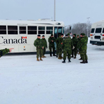 After arriving from CFB Gagetown Reserve & Regular Force, CAF members load equipment onto a Royal Canadian Air Force CC-130J Hercules before departing for Newfoundland. Our Canadian Armed Forces members are Strong, Proud and Ready to support Canadians during domestic operations . Credit: 5th Canadian Division