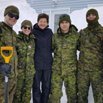 After clearing out some exceptionally deep snow, finally enabling residents to exit their home, members of 2 Platoon pose for a quick picture before moving on to the next task! Credit: 1st Battalion, The Royal Newfoundland Regiment