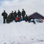 Parents were quick to ask for pictures of our members with the local youth during relief efforts. Credit: 1st Battalion, The Royal Newfoundland Regiment