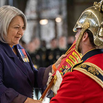 Her Excellency the Right Honourable Mary Simon, Governor General of Canada, presents the Guidon Bearer, Master Warrant Officer Nickerson, with the Fifth Regimental Guidon during the Change of Guidon ceremony on 9 December, 2022 at Garrison Petawawa. Photo - Corporal Jellicoe 
