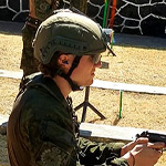 OCdts Philippe Couture (front), Jack O’Connell and Josh Tremblay prepare to shoot the Beretta 92FS 9mm pistol. All team veterans are very skilled in pistol shooting, the RMC Military Skills Team took 1st place on this stand.