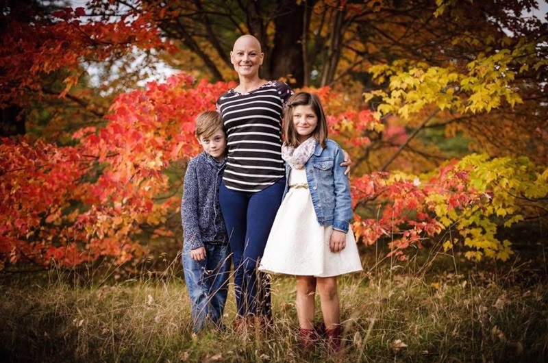 MWO LaLena Brown-Lavigne stands with her two children